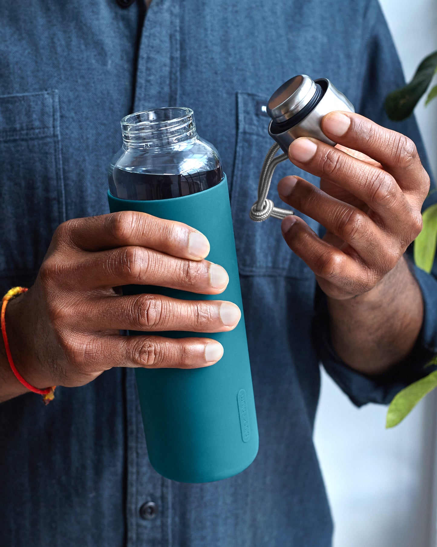 Black+Blum leak proof glass water bottle blue