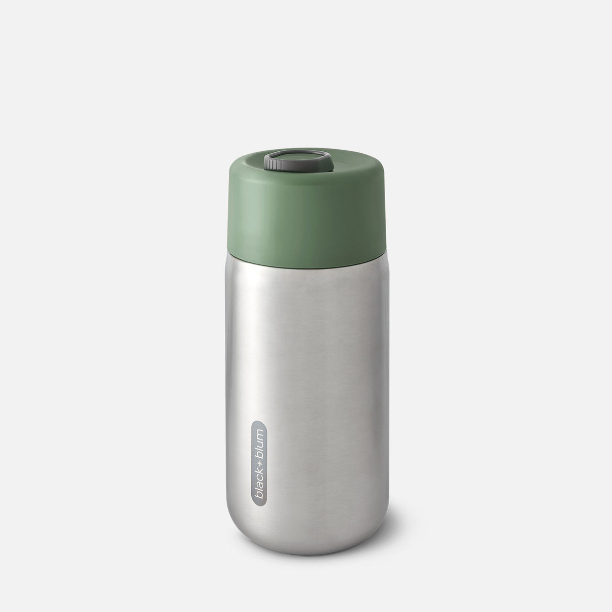 A stainless steel insulated travel cup with a green lid.