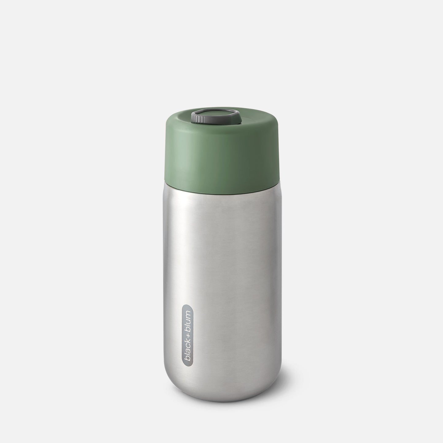 A stainless steel insulated travel cup with a green lid.
