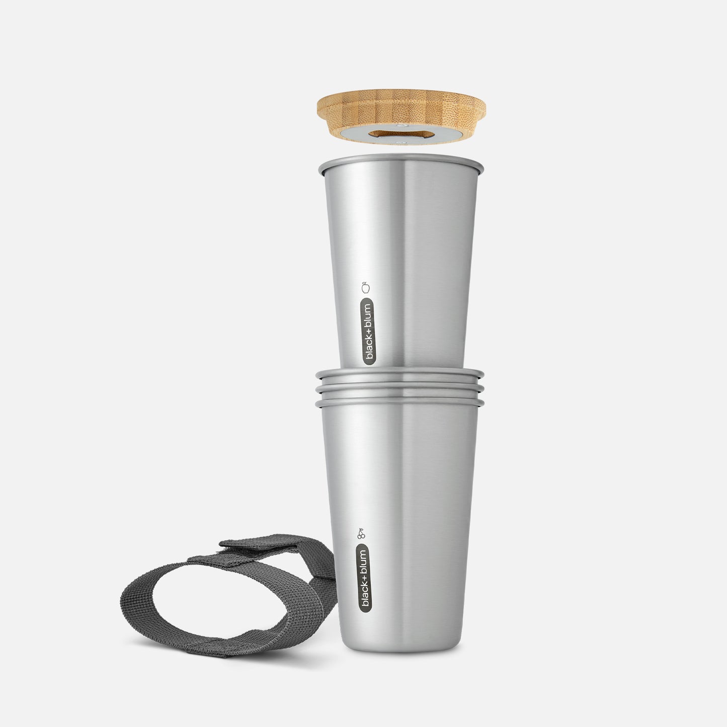 Set of four stainless steel cups with travel strap and lid
