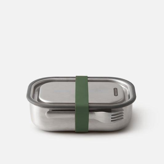 A silver stainless steel lunch box with a green strap securing the lid.