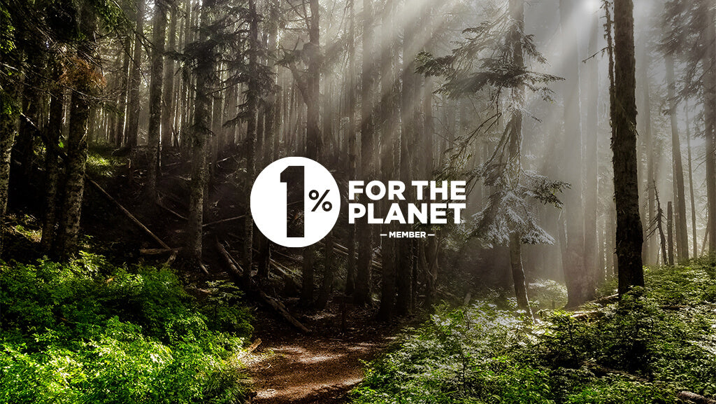 Forest with sunlight and 1% for the Planet Logo